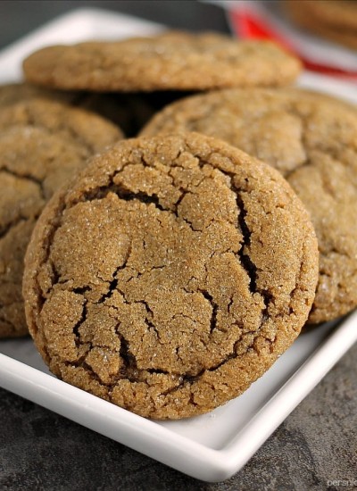 close up of ginger snap cookies on white plate