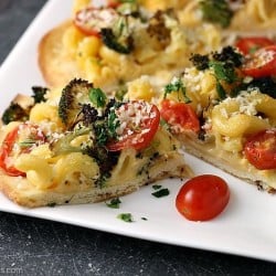 Macaroni and Cheese Flatbread topped with roasted broccoli, grape tomatoes, and panko bread crumbs makes a filling dinner or a great appetizer. | www.persnicketyplates.com