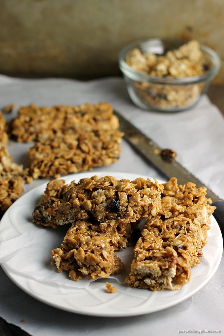 No Bake Chewy Granola Bars filled with peanut butter, honey, raisins, dates, and pecans are a healthy start to your day. With only five ingredients, you can whip them up in no time! | www.persnicketyplates.com