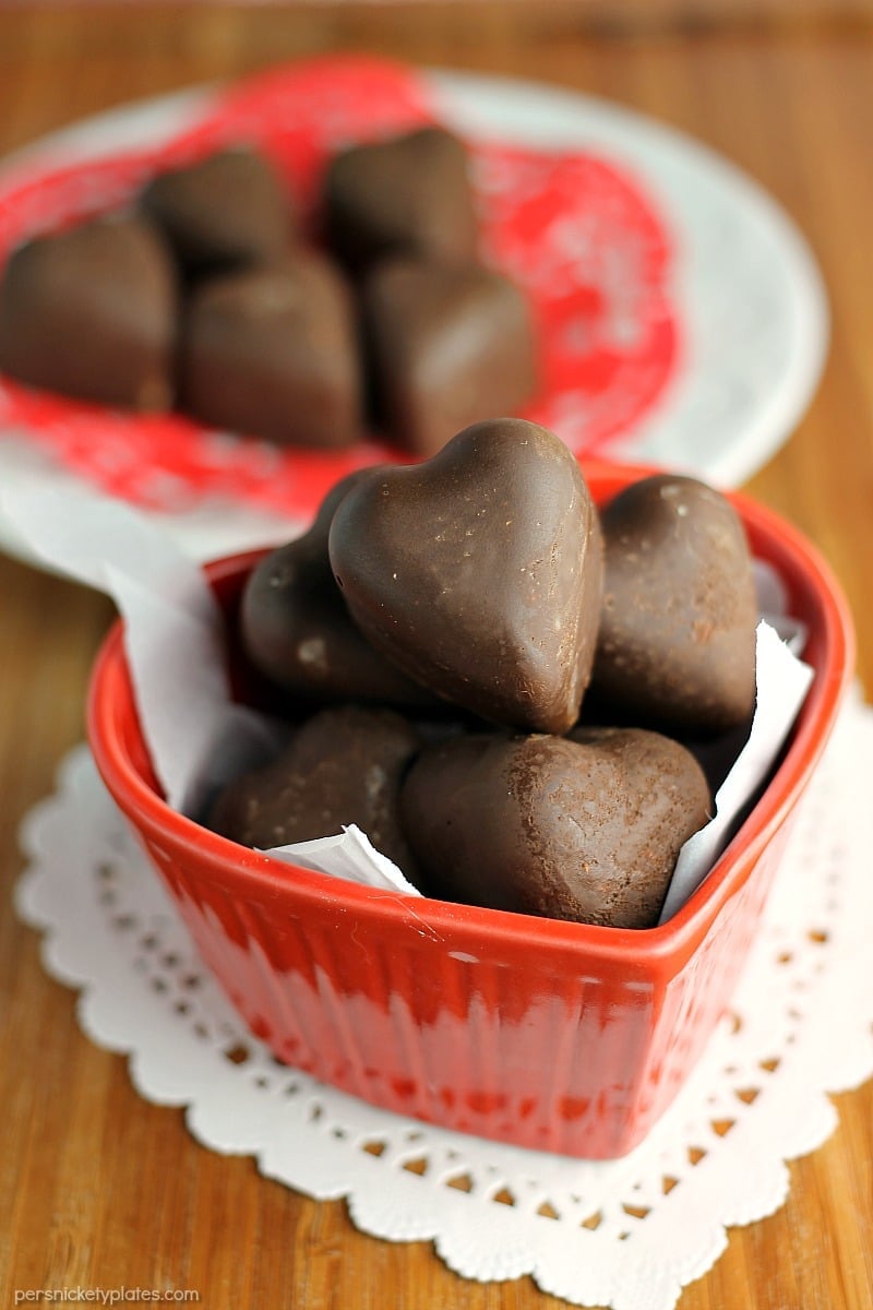 Dark Chocolate Toasted Almond and Coconut Hearts are a sweet, homemade goody perfect for Valentine's Day or anytime you want to treat yourself. | www.persnicketyplates.com
