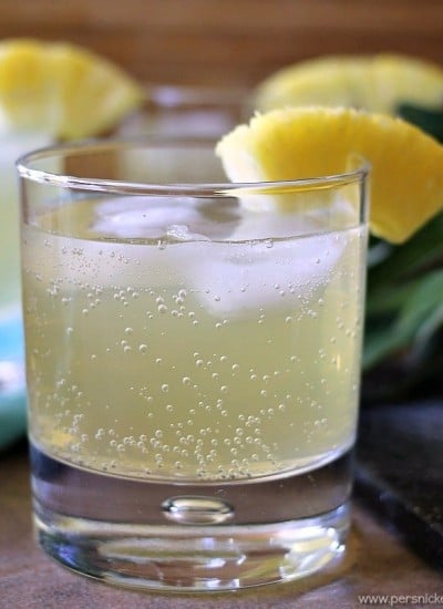 Skinny Pineapple Coconut Cocktail is a fizzy, low calorie drink that is perfect for summertime. | www.persnicketyplates.com