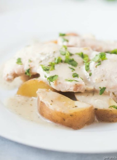 Slow Cooker Creamy Ranch Pork Chops & Potatoes – six ingredients and a full meal right in your slow cooker! | www.persnicketyplates.com
