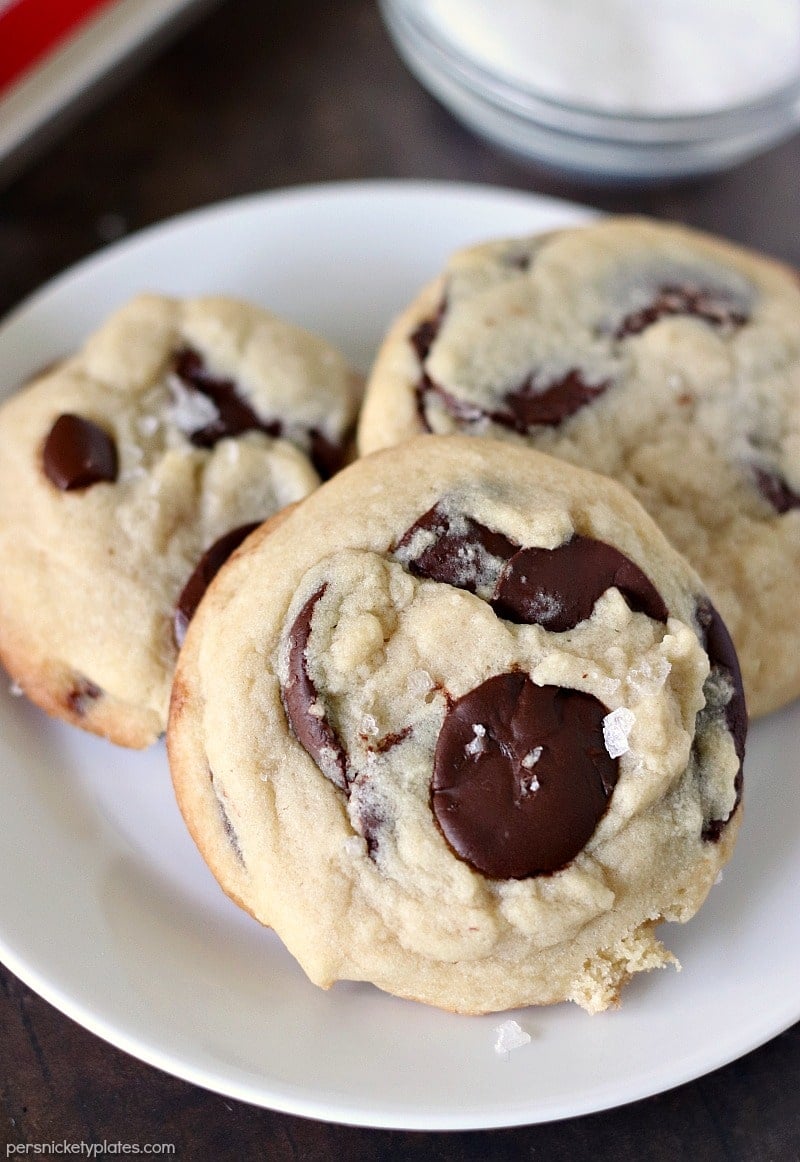 closeup of three Salted Chocolate Chip Cookies on a white plate
