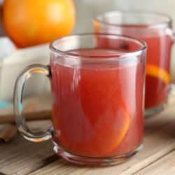 glass mug of cranberry orange cider.