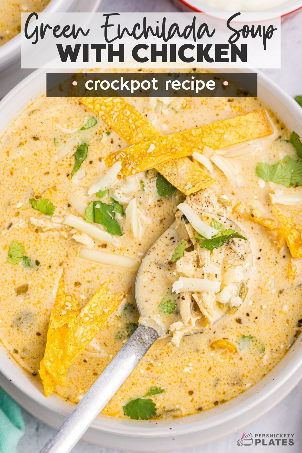 Slow Cooker Green Enchilada Soup takes everything you love about salsa verde chicken enchiladas and puts it in soup form. It's especially easy because it's a crock pot recipe! www.persnicketyplates.com
