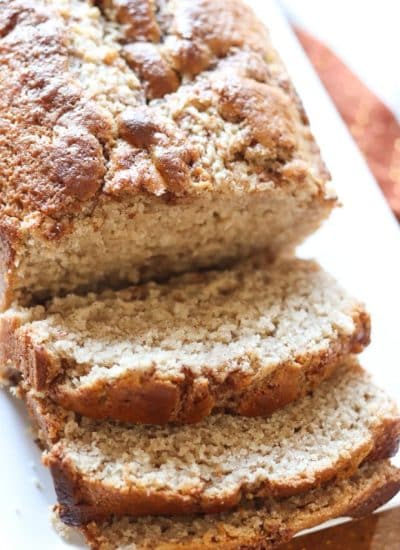 Cinnamon Quick Bread could be called Cinnamon VERY Quick Bread! A simple, from scratch quick bread topped with a cinnamon streusel swirl. | www.persnicketyplates.com