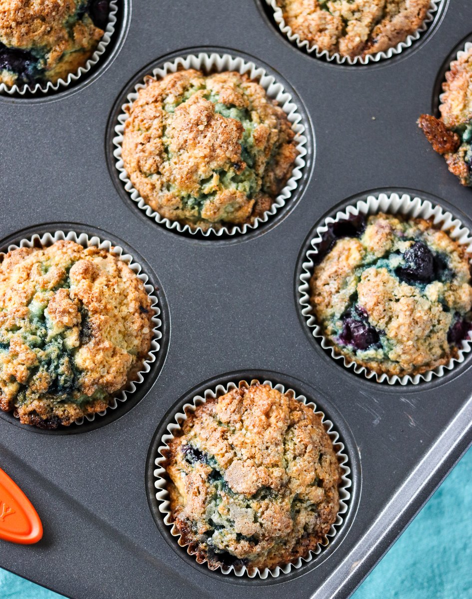 blueberry muffins in muffin pan 