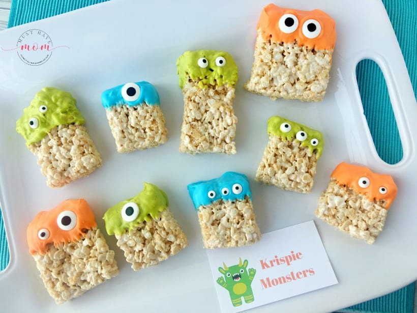 colorful frosting dipped rice krispy treats with monster eyeballs