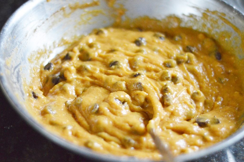 pumpkin chocolate chip muffin batter in mixing bowl