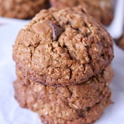 close up stack of oatmeal molasses chocolate chip cookies