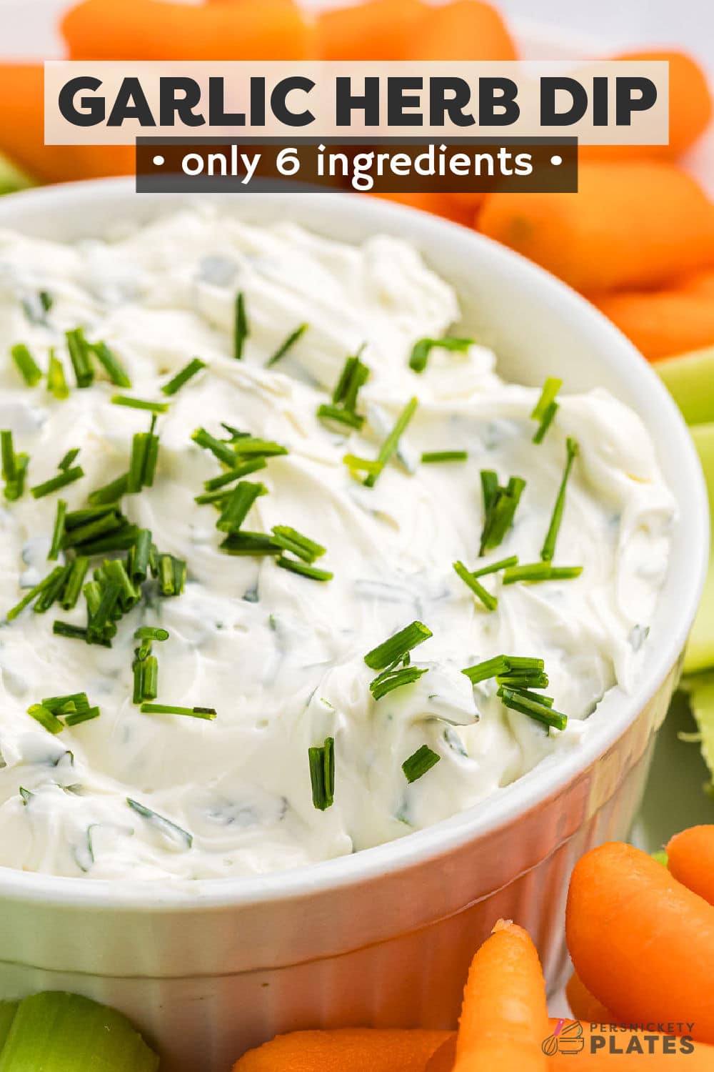 Garlic Herb Dip starts with a cream cheese base and then is filled with fresh herbs. Pair this super easy dip recipe with crackers, chips, or veggies to make the perfect quick snack for your next party or game day. | www.persnicketyplates.com