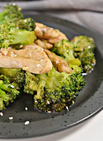 chinese chicken and broccoli on grey plate