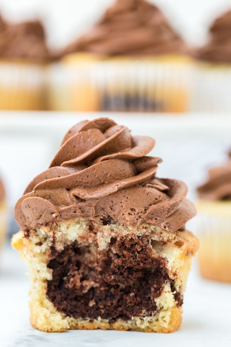 inside of a marble cupcake with chocolate frosting