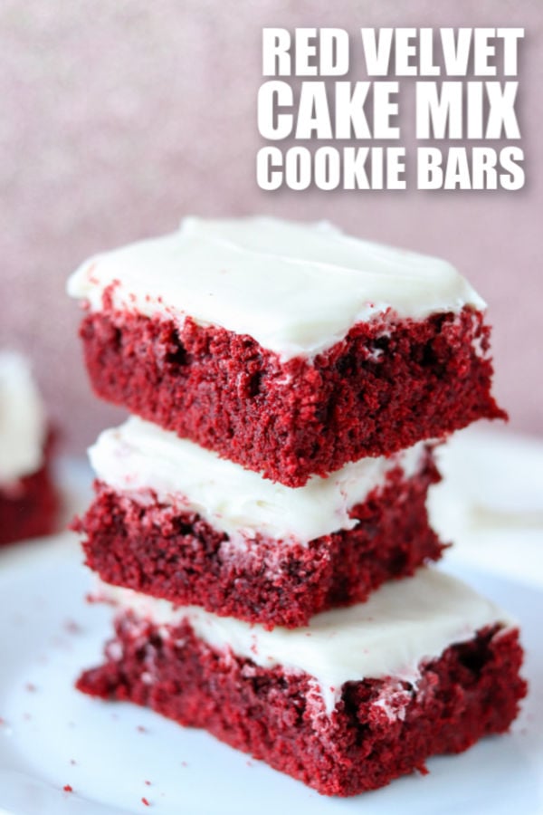 stack of red velvet cookie bars with cream cheese frosting