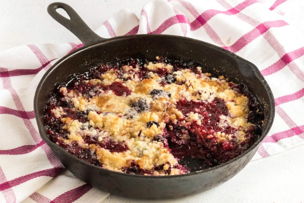 blackberry crumble in a cast iron skillet