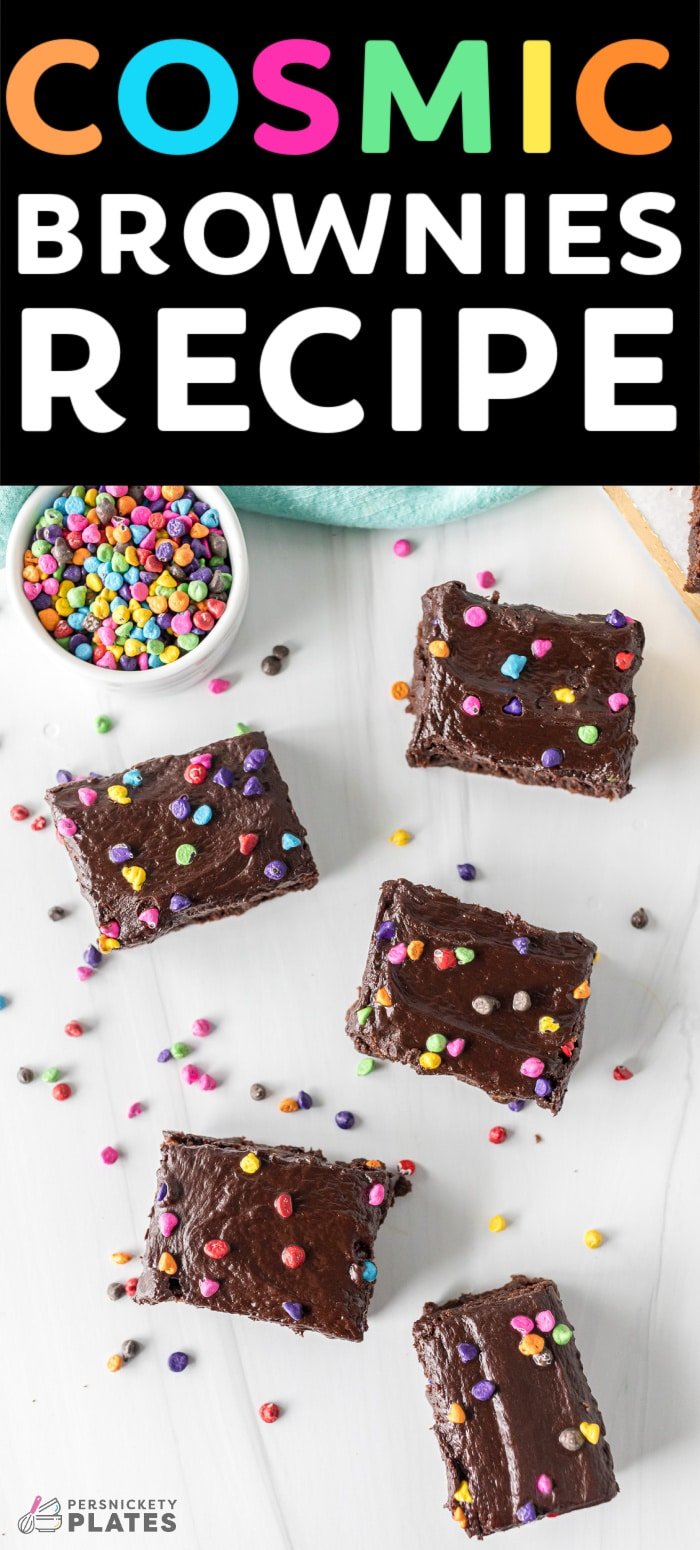 This homemade Cosmic Brownie recipe is a copycat version of Little Debbie's famous treat. A chewy decadent brownie topped with a rich chocolate ganache and rainbow chips. If you liked the classic rainbow sprinkle brownies, you'll love this upgraded version even more! | www.persnicketyplates.com
