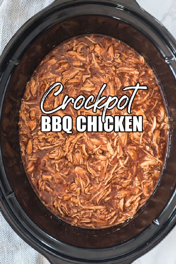 overhead shot of pulled bbq chicken in slow cooker