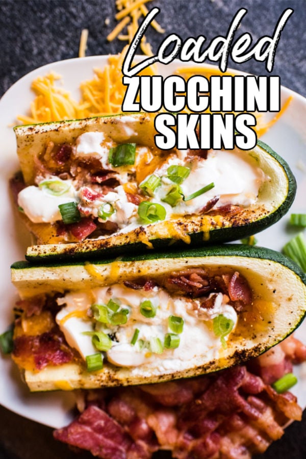 overhead shot of cheesy loaded zucchini skins with text overlay