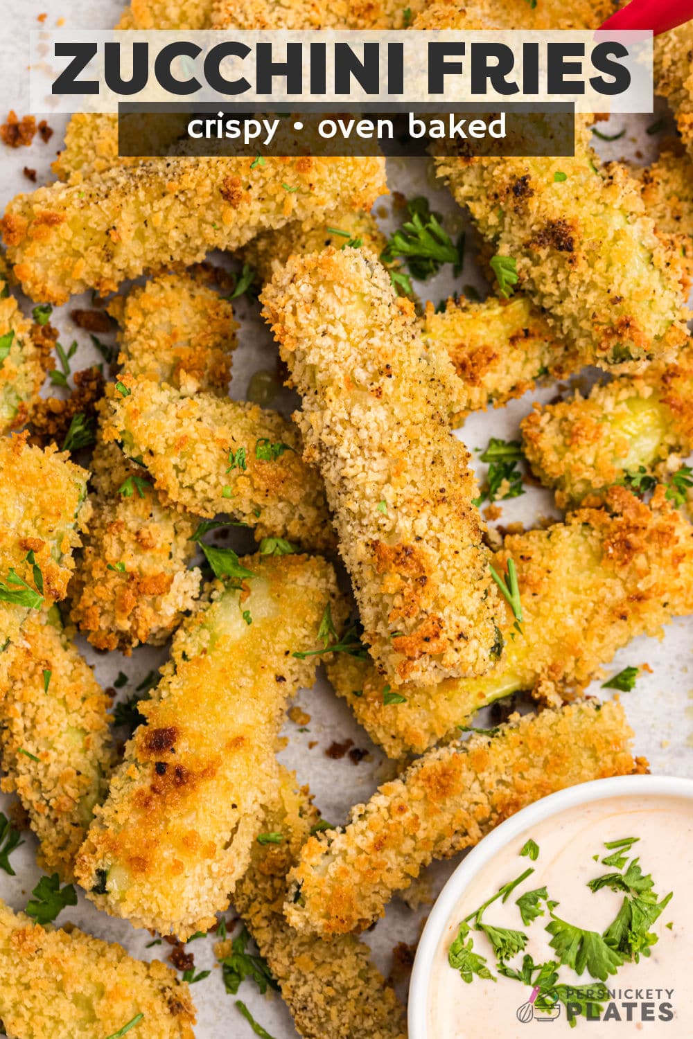 Panko Crusted Zucchini Fries are crispy and seasoned on the outside, tender on the inside, and a great alternative to french fries. Serve with your favorite dipping sauce and even your kids will be asking for seconds! | www.persnicketyplates.com