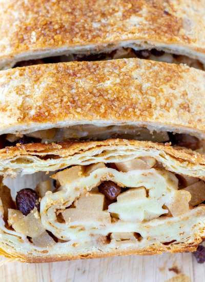 close up of two slices of apple strudel