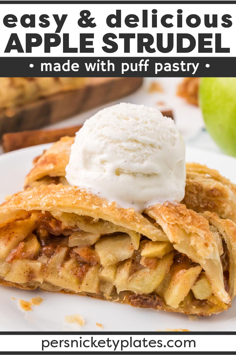 This easy Apple Strudel may look fancy but it's so simple to put together! Puff pastry dough is filled with apples, cinnamon, brown sugar, and raisins, brushed with melted butter, sprinkled with turbinado sugar and baked until golden brown. Perfect for special occasions but easy enough for any day! | www.persnicketyplates.com