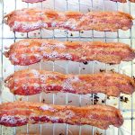 overhead shot of bacon on a cooling rack
