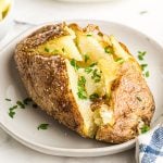 baked potato topped with butter & chives