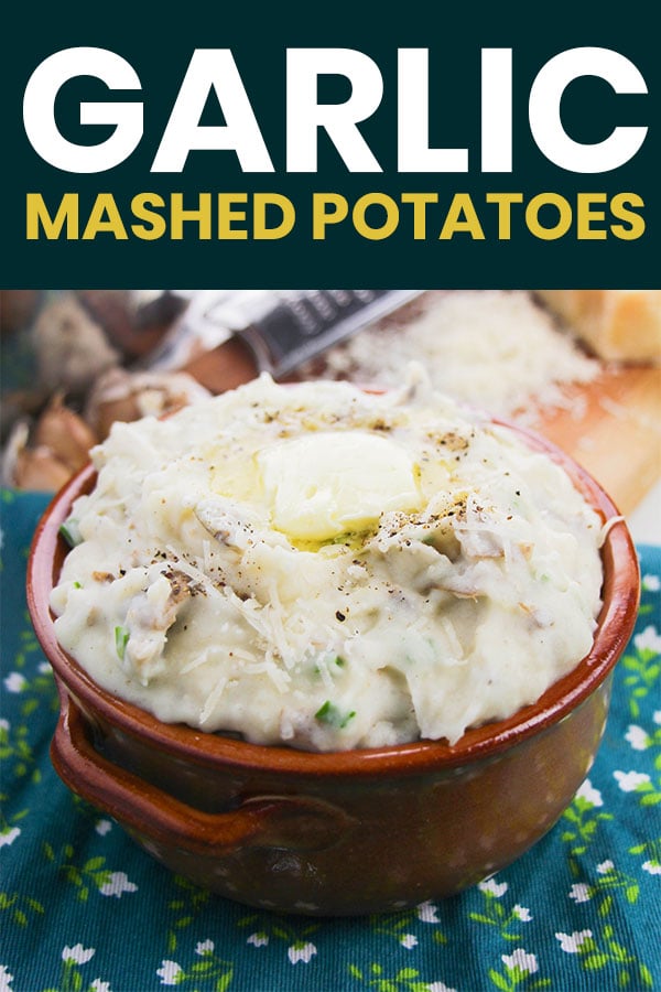 garlic mashed potatoes in a bowl with text that reads garlic mashed potatoes