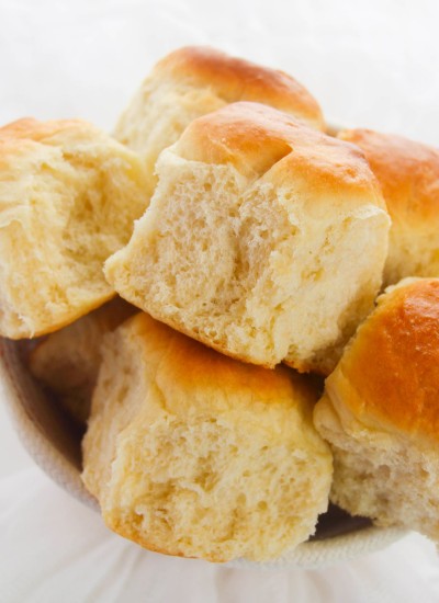 several dinner rolls in a bowl from above