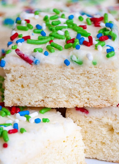 close up of stack of sugar cookie bars with colorful sprinkles