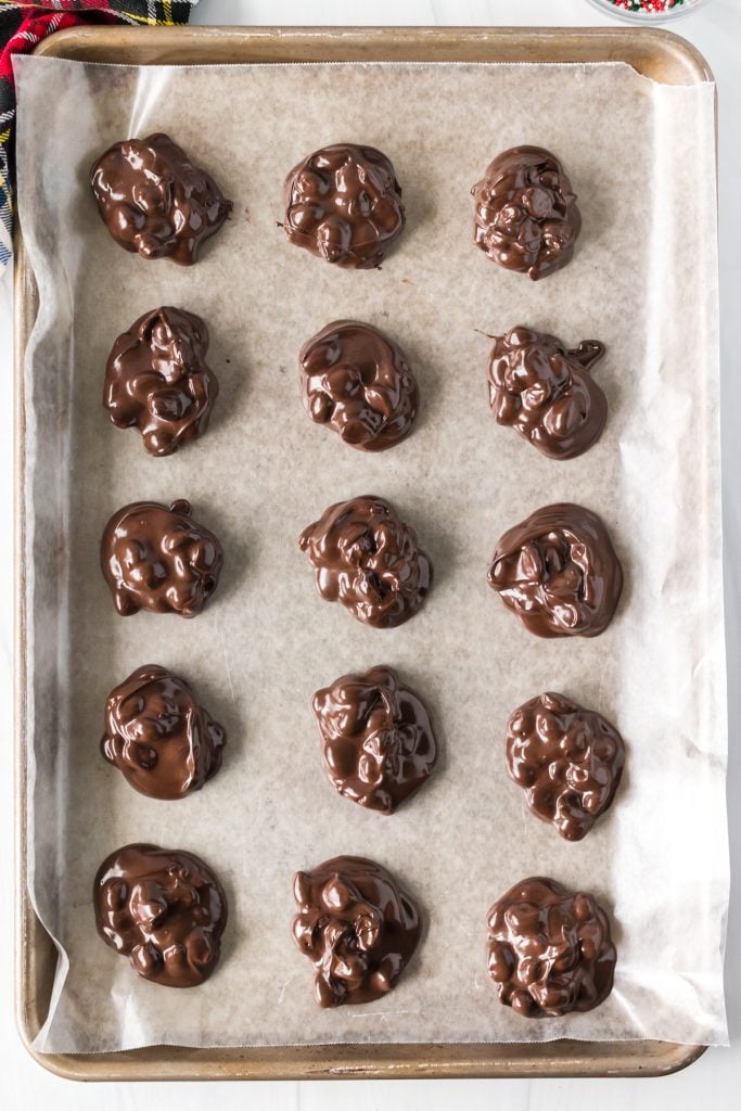 overhead shot of baking sheet with chocolate clusters