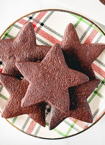 plate of star shaped chocolate shortbread cookies