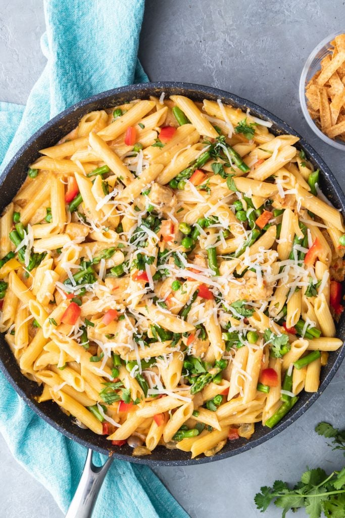 overhead shot of chipotle chicken pasta in a skillet