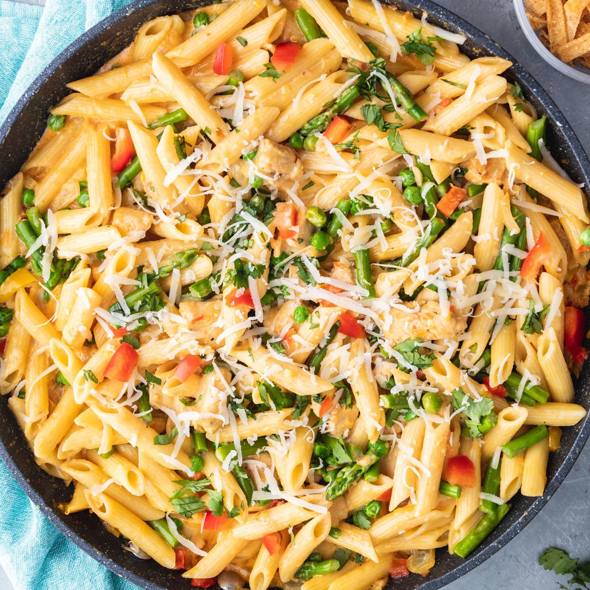 closeup of spicy chicken chipotle pasta in a skillet