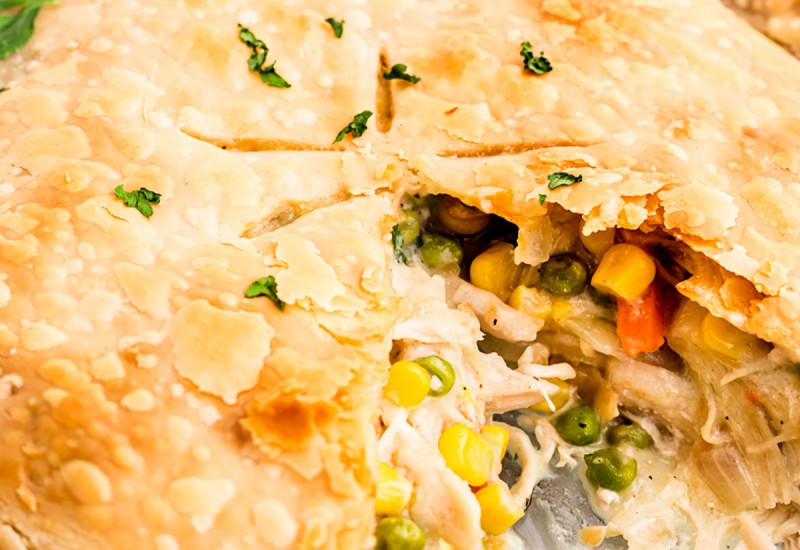 closeup of chicken pot pie with a slice missing