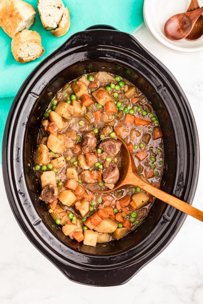 overhead shot of beef stew in crockpot bowl