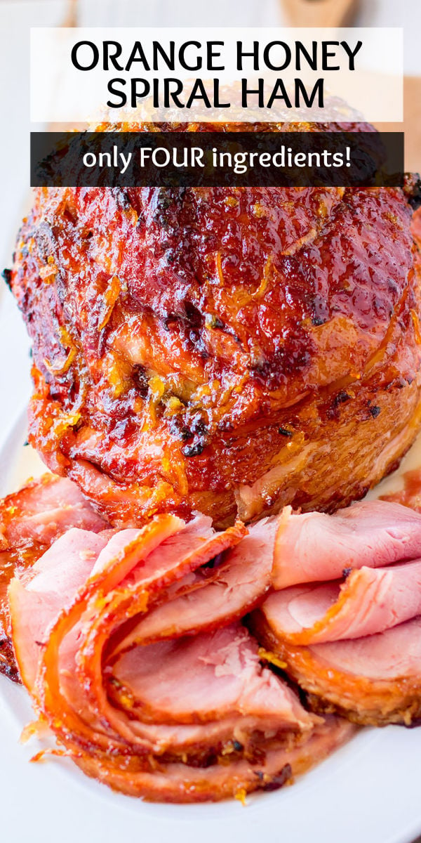 Orange Honey Spiral Ham is juicy, sweet, and perfect for a holiday dinner table. With only four ingredients, this glazed baked ham is a winner! | www.persnicketyplates.com