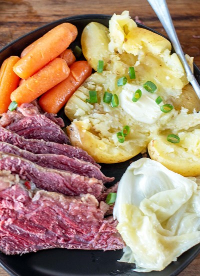 plate of corned beef, cabbage, potatoes, and carrots