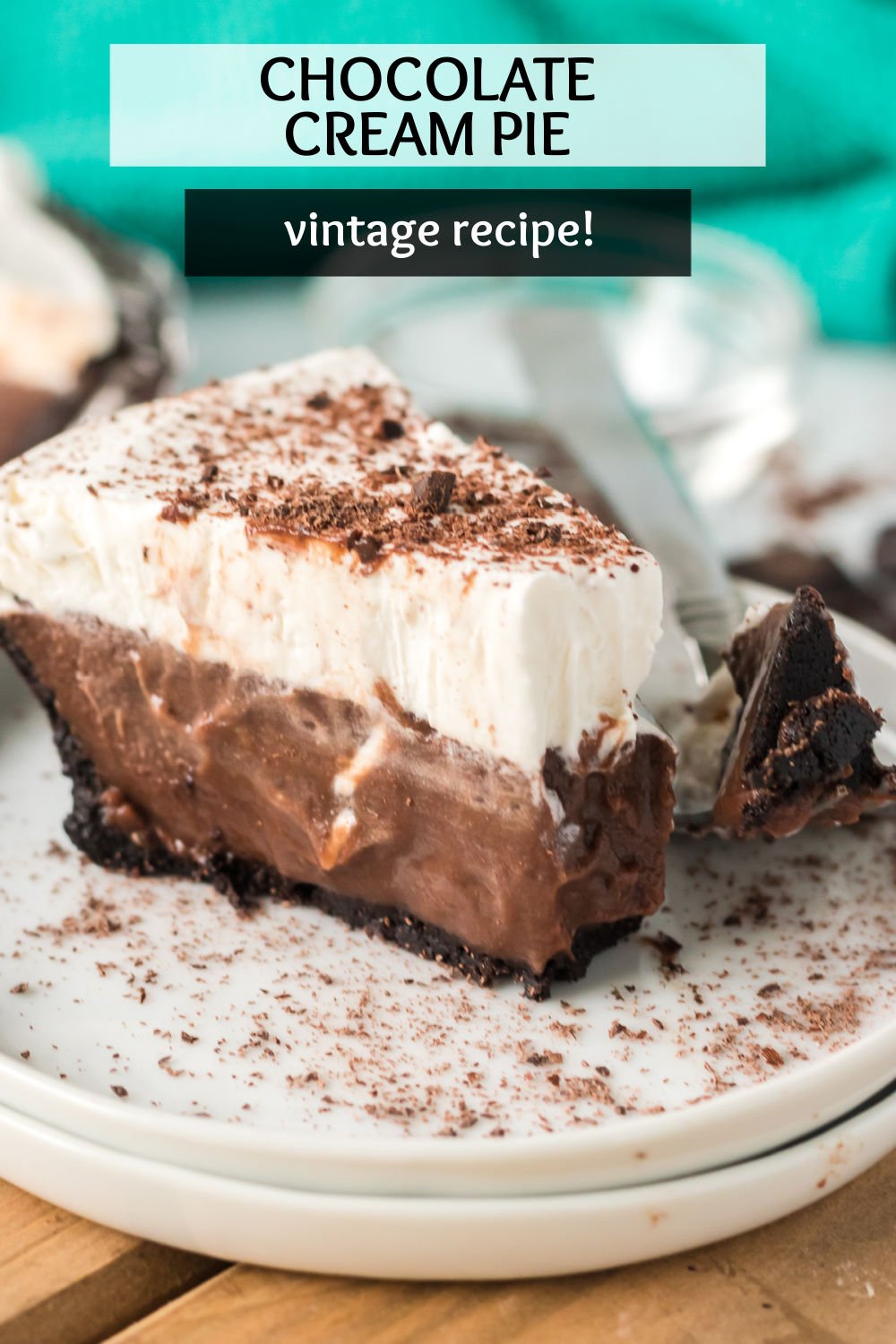 Easy Chocolate Cream Pie is a delicious, chocolatey vintage dessert sure to please the whole family! Homemade chocolate pudding topped with homemade whipped cream in an Oreo pie crust makes a cold, creamy dessert that is perfect for chocolate lovers. | www.persnicketyplates.com