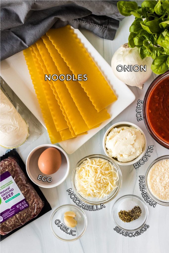 overhead shot of ingredients laid out to make slow cooker lasagna