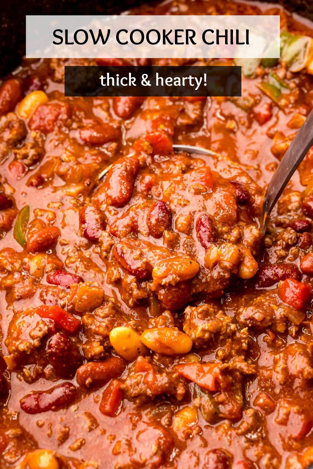 This thick and hearty classic slow cooker chili recipe is filling, easy, and full of flavor. Cooked slowly in the crockpot and then loaded with your favorite toppings, this meal makes everyone happy! | www.persnicketyplates.com