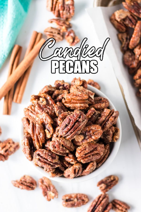 overhead shot of candied pecans in a bowl with text reading "candied pecans"