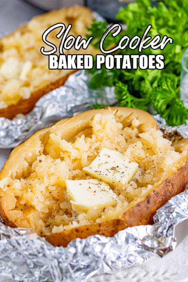 baked potato sitting in foil topped with butter with text overlay reading "slow cooker baked potatoes"
