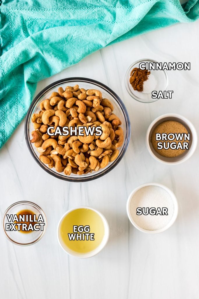 overhead shot of labeled ingredients in bowls to make candied cashews