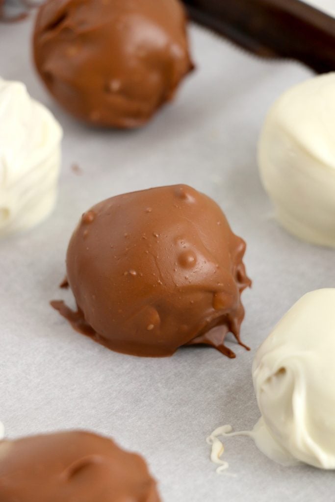 a chocolate dipped cookie dough truffle