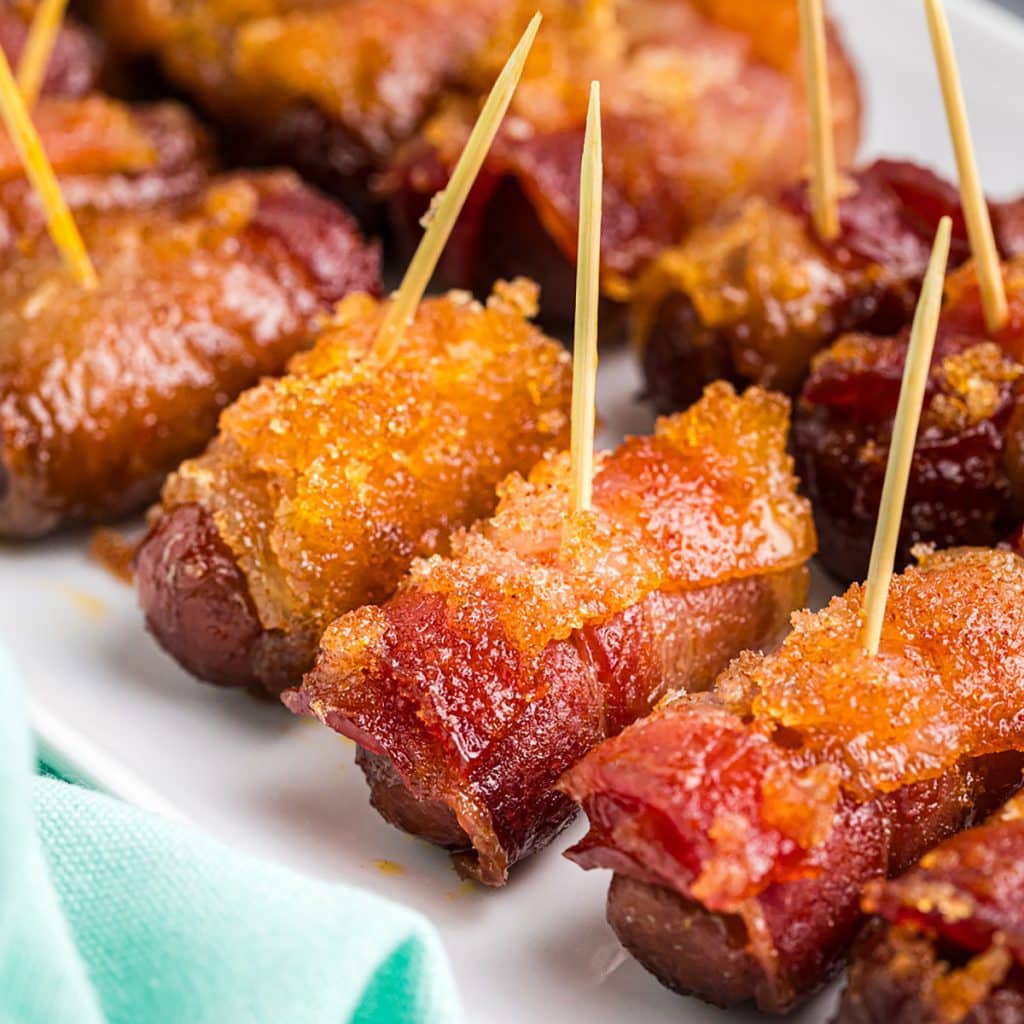 closeup of toothpicks in bacon wrapped lil smokies.