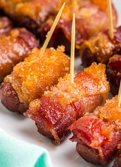 closeup of toothpicks in bacon wrapped lil smokies.