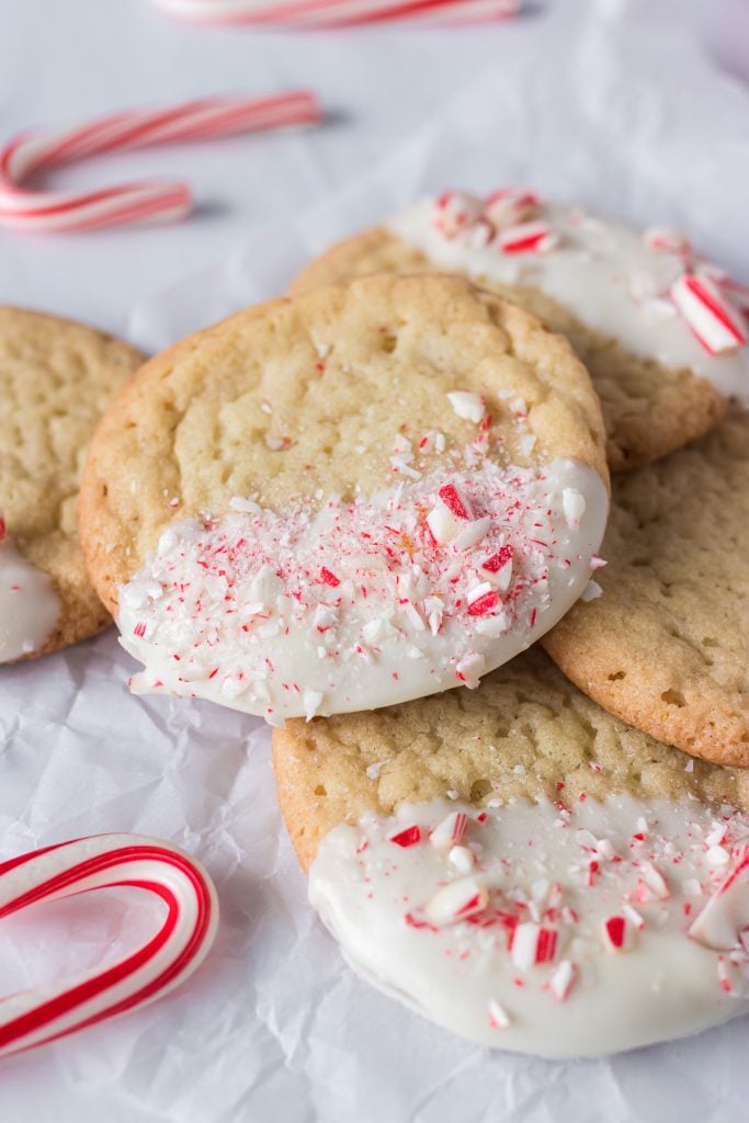stack of white chocolate dipped peppermint sugar cookies