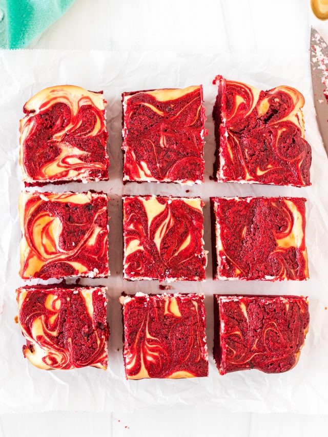 overhead shot of red velvet cheesecake brownies sliced into 9 brownies.