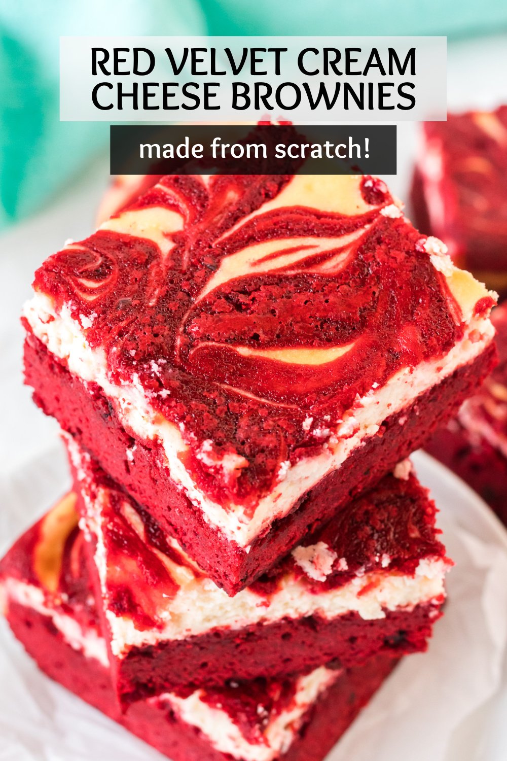 Red Velvet Cheesecake Swirl Brownies are made from scratch but so easy! A rich, red velvet brownie topped with a creamy cheesecake topping - swirled together for a dessert that is as pretty as it is delicious! | www.persnicketyplates.com